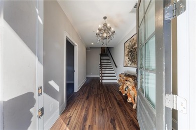 Welcome to refined townhome living in the heart of Sandy Springs