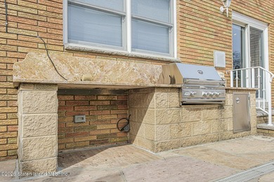 Welcome to this custom-built two-family detached home! This - photo 48