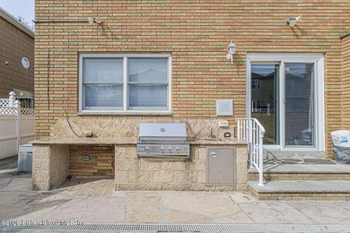 Welcome to this custom-built two-family detached home! This - photo 50
