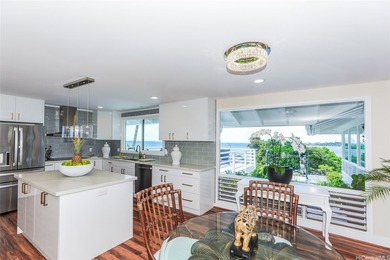 Experience luxury island living in this impeccably remodeled - photo 8