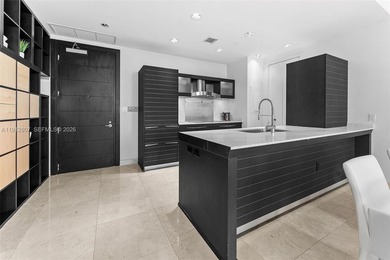 Live in the heart of Downtown Miami in this stunning 2 Bed + Den