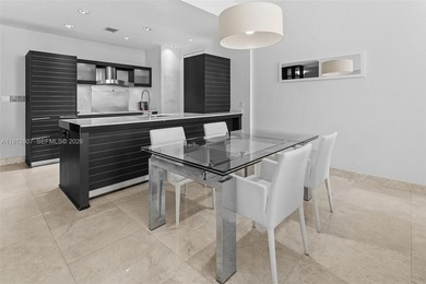 Live in the heart of Downtown Miami in this stunning 2 Bed + Den