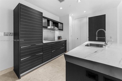 Live in the heart of Downtown Miami in this stunning 2 Bed + Den