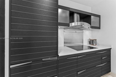 Live in the heart of Downtown Miami in this stunning 2 Bed + Den