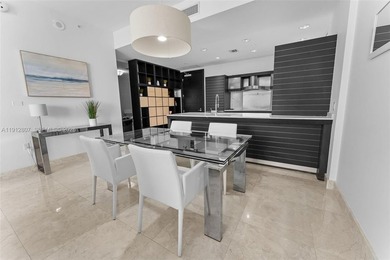 Live in the heart of Downtown Miami in this stunning 2 Bed + Den