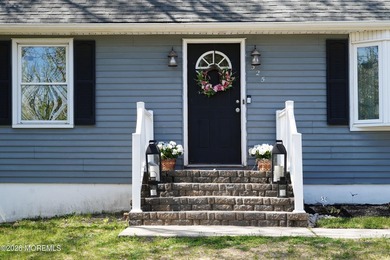 Nestled in Bricks desirable Herbertsville community, this - photo 4