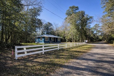 Discover your newly remodeled retreat in the coveted *Land of - photo 1