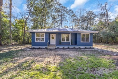 Discover your newly remodeled retreat in the coveted *Land of - photo 3