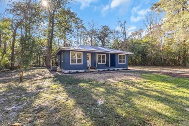 Discover your newly remodeled retreat in the coveted *Land of - photo 4
