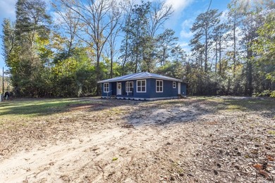 Discover your newly remodeled retreat in the coveted *Land of - photo 5