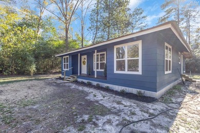 Discover your newly remodeled retreat in the coveted *Land of - photo 6