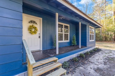 Discover your newly remodeled retreat in the coveted *Land of - photo 7