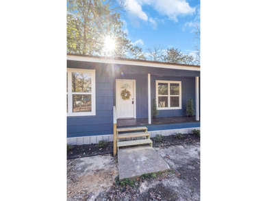 Discover your newly remodeled retreat in the coveted *Land of - photo 8