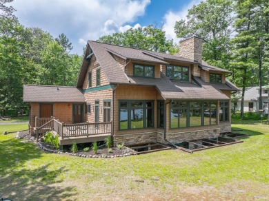 Escape to this stunning Little St. Germain Lake home, nestled on - Lake Home For Sale in Saint Germain, Wisconsin