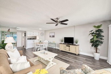 Wake up to stunning Gulf-front views in this charming - photo 11
