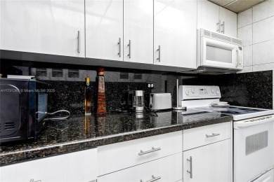 Beautifully renovated 2 bedrooms 1.5 bathroom unit in the heart