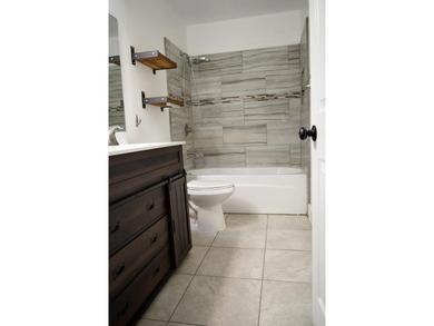 Welcome home to this delightful 3-bedroom, 2-bath cottage-style - photo 19