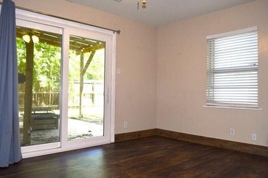 Welcome home to this delightful 3-bedroom, 2-bath cottage-style - photo 24