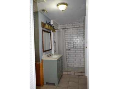 Welcome home to this delightful 3-bedroom, 2-bath cottage-style - photo 26