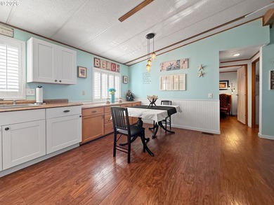 Coastal Cottage Charm Awaits! Bursting with personality, color - photo 9
