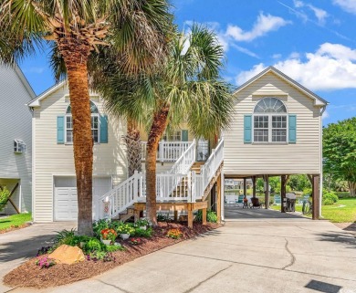 Lake Home For Sale in Garden City Beach, South Carolina
