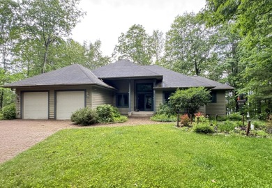 This spacious 4-BD, 3.5 BA home is situated on quiet MALBY LAKE - Lake Home For Sale in Minocqua, Wisconsin