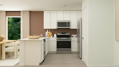 The Newlin - This single-level home showcases a spacious open - photo 15