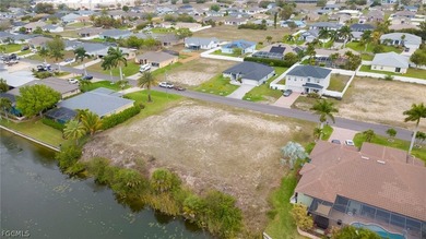 Build your dream home on this beautiful cleared freshwater canal - photo 4