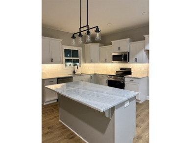 This stunning modern farmhouse offers approximately 1,790 sq. ft