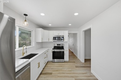 OWNER WILL SHORT TERM CARRY. Stunningly Remodeled Home with - photo 15