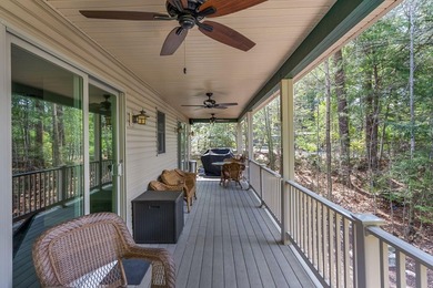 Enjoy exceptional waterfront living on Big Sebago Lake from this - photo 17