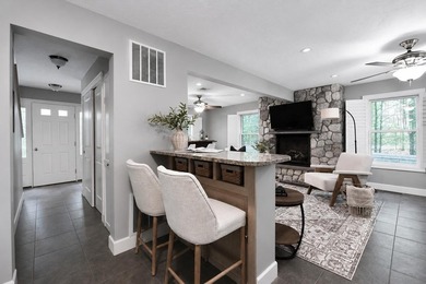 Enjoy exceptional waterfront living on Big Sebago Lake from this - photo 30