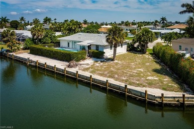 Paradise Priced Perfectly! This three-bedroom, two-bath property - photo 2