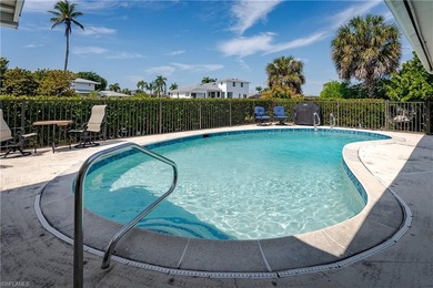 Paradise Priced Perfectly! This three-bedroom, two-bath property - photo 6