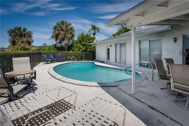 Paradise Priced Perfectly! This three-bedroom, two-bath property - photo 8