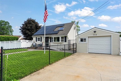 Charming and well-maintained 3-bedroom, 1-bath Cape nestled on a - photo 2