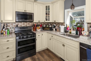 Charming and well-maintained 3-bedroom, 1-bath Cape nestled on a - photo 3