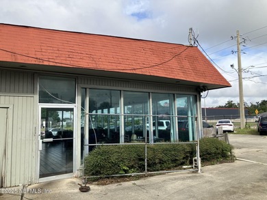 This high-visibility commercial property offers a rare - photo 3