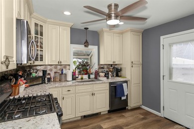 Charming and well-maintained 3-bedroom, 1-bath Cape nestled on a - photo 4