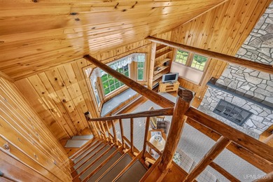 Enjoy 138 feet of sandy-bottom frontage on beautiful Gulliver - photo 9