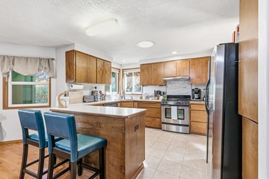 Welcome to 1841 Cascadia Circle, a spacious 2,076 sq. ft. home