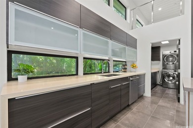 Experience the pinnacle of Windward Oahu living in this - photo 5