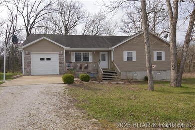 Welcome to your dream home in Gravois Mills! This delightful - photo 32