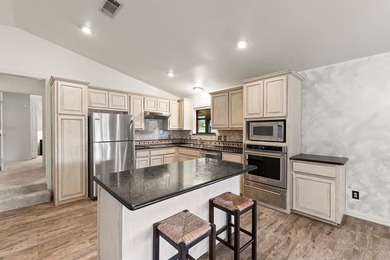 Tucked away in the desirable community of Villa Cove on Cedar - photo 5