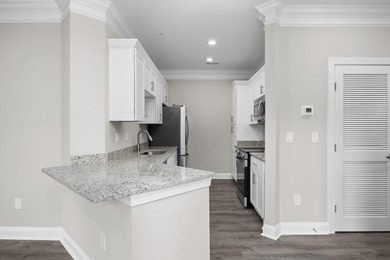 Indulge in coastal luxury with this stunning 3-bedroom - photo 9