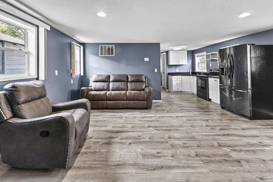 Wake up to beautiful views of Houghton Lake from the spacious - photo 12