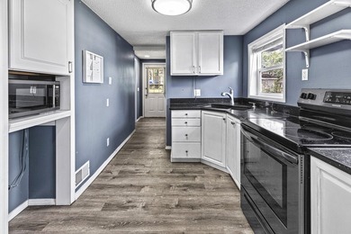 Wake up to beautiful views of Houghton Lake from the spacious - photo 17