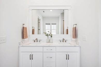 Located in WaterSound Origins, this Ficus plan built by Huff - photo 20