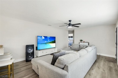 You will not want to miss this completely renovated - photo 3