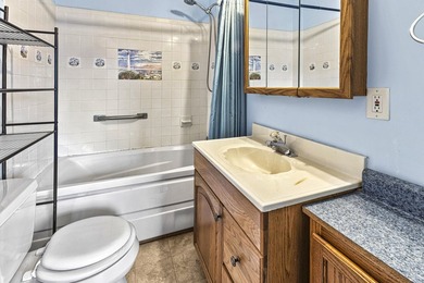 Wake up to beautiful views of Houghton Lake from the spacious - photo 27